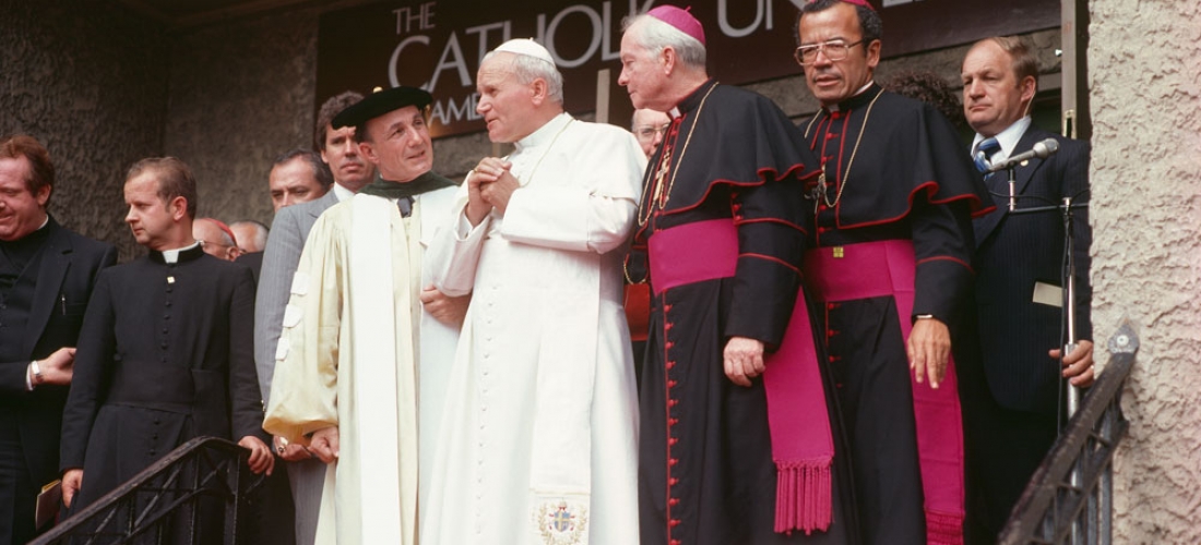 POPE JOHN PAUL II SPEAKS WITH THEN-PRESIDENT OF CATHOLIC UNIVERSITY EDMUND D. PELLEGRINO DURING HIS VISIT IN 1979.