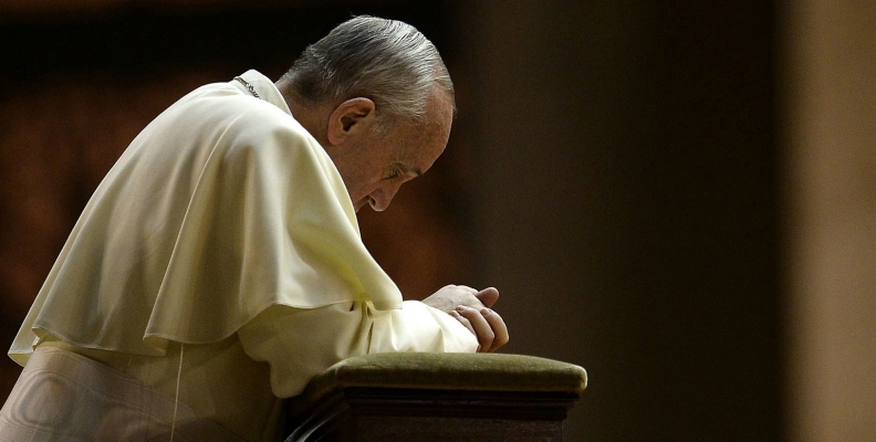 Pope Francis at prayer.