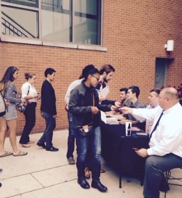 Students Picking Up Tickets